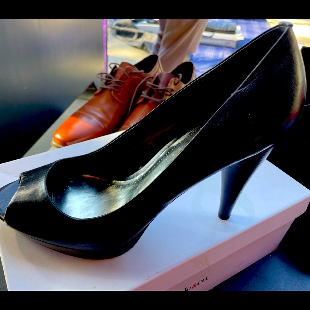 Black leather platform heels.  Very comfortable and sassy.